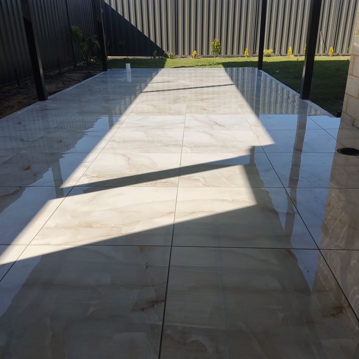 Polished large-format tiles on an alfresco floor