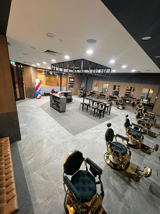 Finished barber shop floor with chairs in place