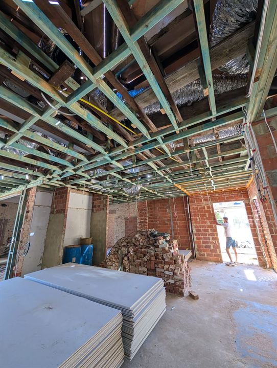 New ceiling framing and plasterboard during a full renovation