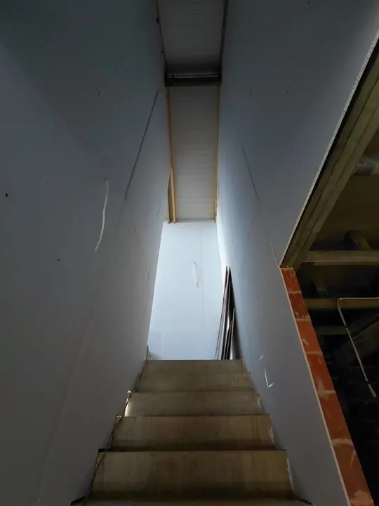 Stairwell lined in plasterboard from top to bottom